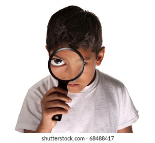 Young Latino Boy Looking Through Magnifying Stock Photo 68488417 ...