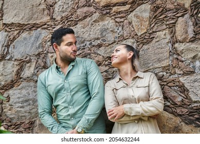 Young Latino Male And Female Couple Looking At Each Other In Love Between 25 And 35 Years Of Age