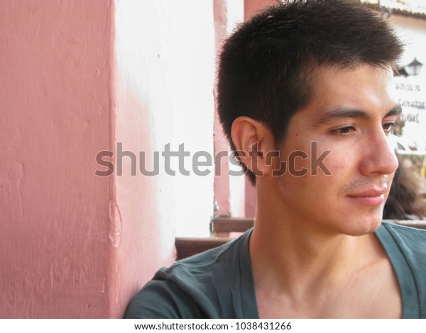 Young Latino Man Short Hair Looks Stock Photo Edit Now 1038431266