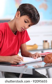 A Young Latino Studying.