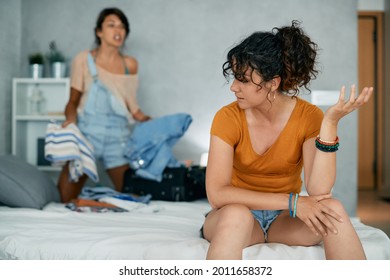 Young Lesbian Couple Having Relationship Difficulties And Arguing At Home.