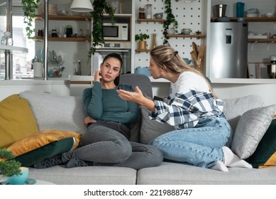 Young Lesbian Couple At Home Have A Problem And Argue Due To Jealousy Caused By Chatting And Flirting Via Social Media Networks On Smart Phones, Relationship Difficulties Problems And Distrust.