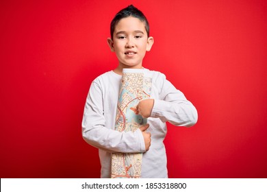 Young Little Boy Kid Looking At Turist City Destination Map Over Red Isolated Background Very Happy Pointing With Hand And Finger