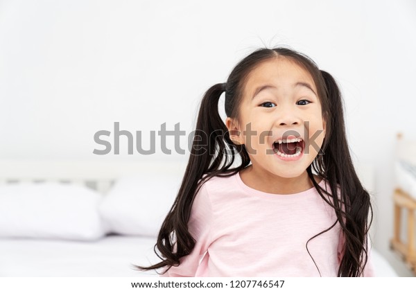 Young Little Cute Asian Girl Smiling Stock Photo (Edit Now) 1207746547