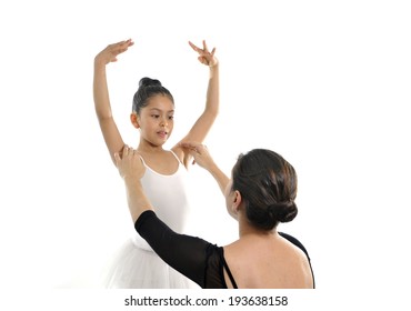 Young Little Girl Ballerina Learning Dance Lesson With Female Ballet Teacher