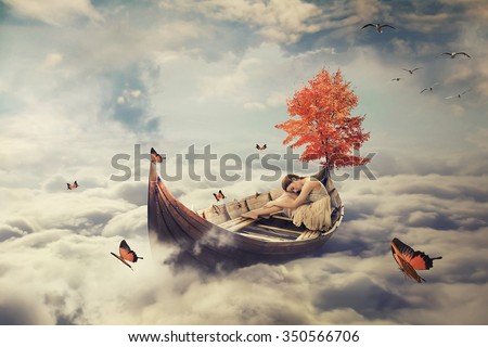 Young lonely beautiful woman drifting on a boat above clouds. Dreamy screensaver with skyline background 