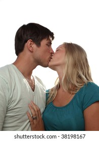 Young lovely couple kissing lovingly - isolated on white