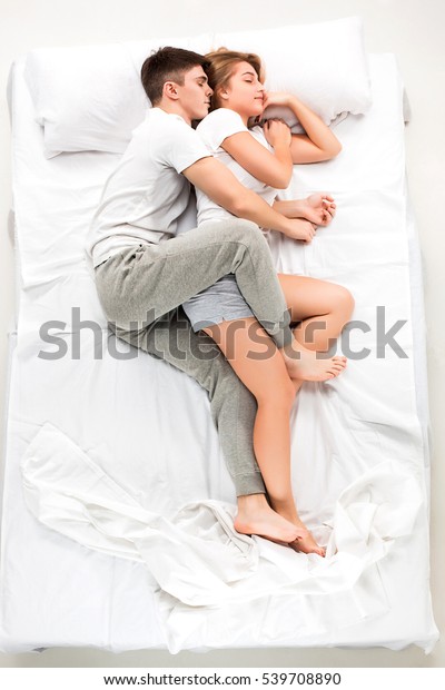Young Lovely Couple Lying W