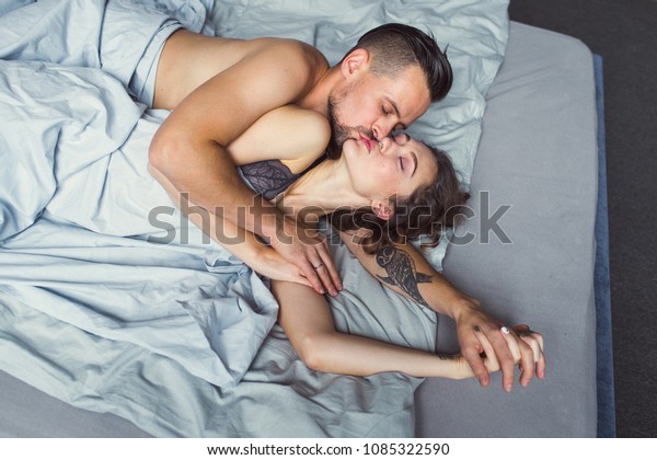 Young Lovely Couple Tattoos Lie On Stock Photo Edit Now