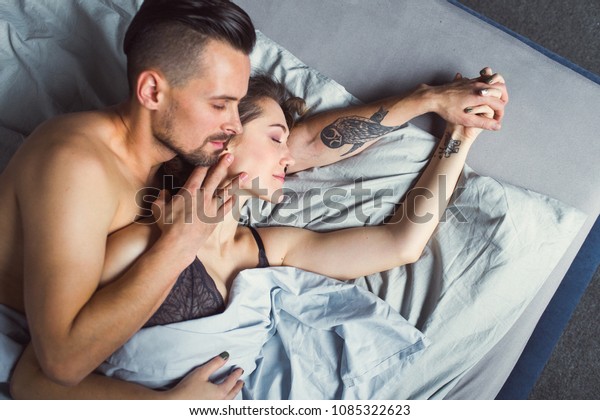 Young Lovely Couple Tattoos Lie On Stock Photo Edit Now