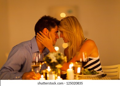 Young Loving Couple Having Romantic Dinner Together