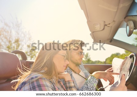 Similar – Two young women resting sitting inside of car