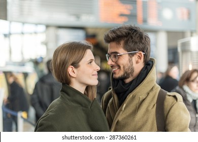 A Young Loving Couple Saying Goodbye In An Airport