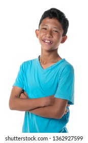 A Young Malay Boy In Casual Clothes Isolated On White Background