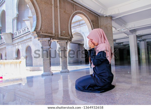 Young Malay Muslim Woman Hold Her Stock Photo Edit Now 1364932658