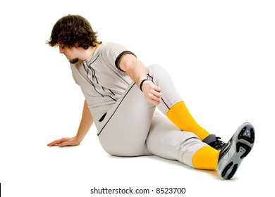 A young male baseball player stretching. - Powered by Shutterstock