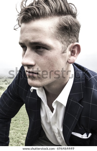 Young Male Blonde Hair Blue Eyes Stock Photo Edit Now 696464449