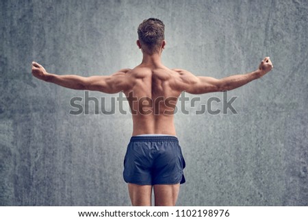 Young male bodybuilder posing