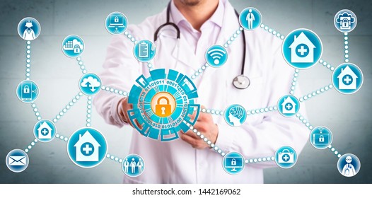 Young Male Clinician Securely Sharing Sensitive Healthcare Data Across Mobile Devices And Medical Practices. IT Concept For Cybersecurity And Secure Information Sharing In The Health Care Industry.