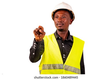 Young male construction engineer wearing a green vest and a white safety helmet while using invisible screen. - Powered by Shutterstock