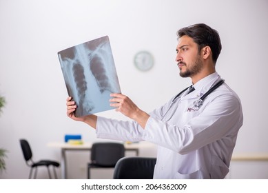 Young Male Doctor Radiologist Sitting In The Clinic