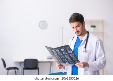 Young Male Doctor Radiologist Working In The Clinic