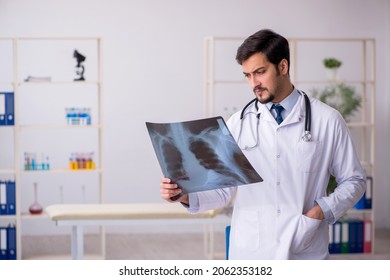 Young Male Doctor Radiologist Working In The Clinic