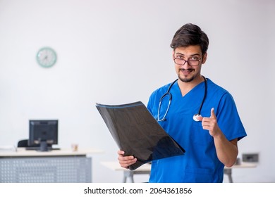 Young Male Doctor Radiologist Working In The Clinic