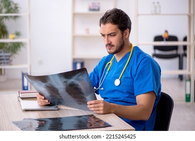 Young Male Doctor Radiologist Working In The Clinic