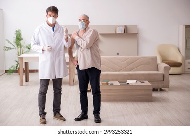 Young male doctor visiting old patient in vaccination concept - Powered by Shutterstock