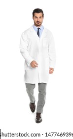 Young Male Doctor Walking On White Background. Medical Service