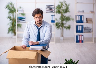 Young Male Employee In Business Relocation Concept