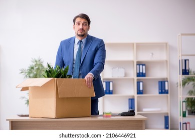 Young Male Employee In Business Relocation Concept