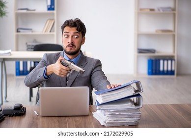 Young Male Employee Committing Suicide In The Office