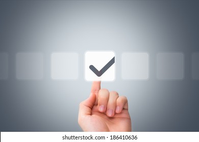 Young Male Hand Touching, Pressing Modern Button And Ticking Check Box Out Of Empty Boxes On Digital Screen Interface On Virtual Background.