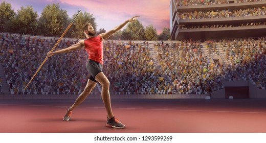 Young male javelin thrower throwing a spear. Athlete in sport clothes at athletic sport track in professional stadium - Powered by Shutterstock