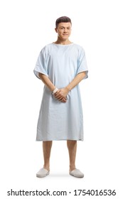 Young Male Patient In A Hospital Gown Isolated On White Background