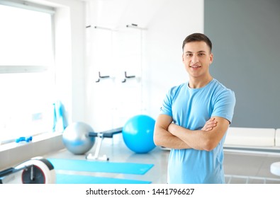 Young Male Physiotherapist In Rehabilitation Center