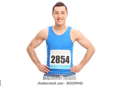 Young Male Runner In A Blue Jersey With A Race Number On His Chest Isolated On White Background