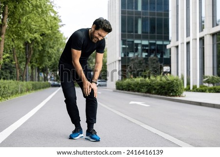 Similar – Image, Stock Photo young man holding his fiance’s hand with gold ring while making a marriage proposal with bouquet of red roses. Engagement of a young couple in love. The concept of love and togetherness.