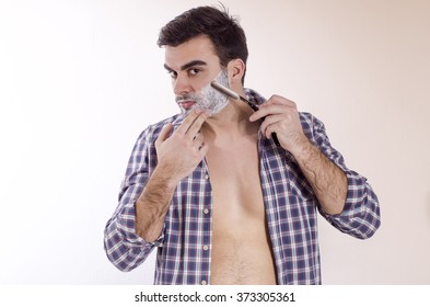 Young Male Shaving With Razor Blade 