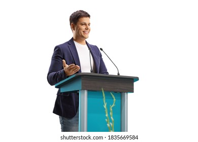 Young male speaker giving a speech on a pedestal isolated on white background - Powered by Shutterstock