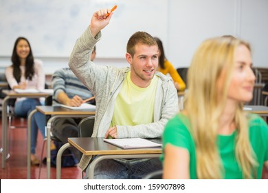 young-male-student-raising-hand-260nw-159907898.jpg