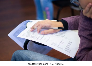 Young Male Student Taking An Important Exam At School. 