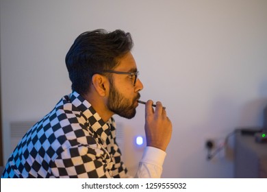 Young Male Vaping