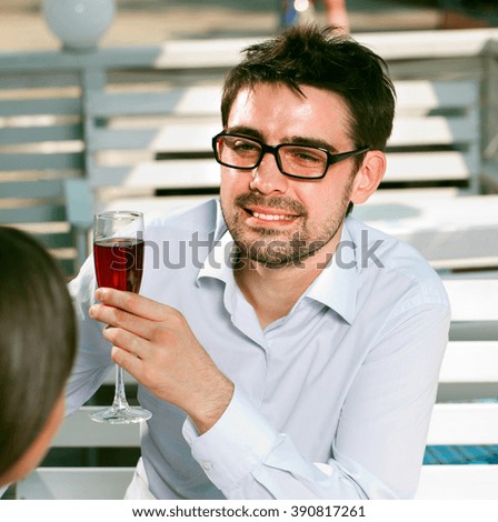young man and the act of women on a romantic date in a cafe