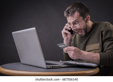 Young Man Angry With Bank About His Credit Card Bill