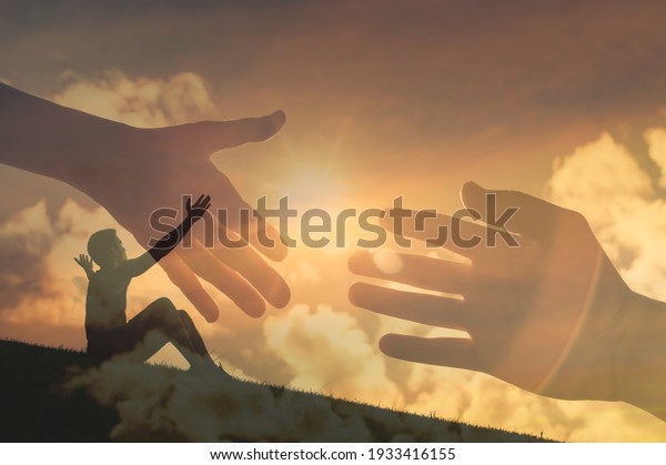 Young man with arms up to the sky\
asking for help. Helping hand, and salvation concept.\

