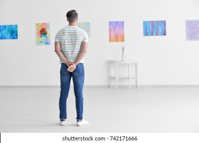 Young Man In Art Gallery