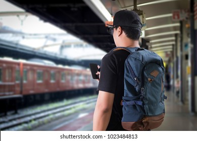 Young Man Asian Happy Tourists  Traveling Backpacker Tourist Traveler On Background View